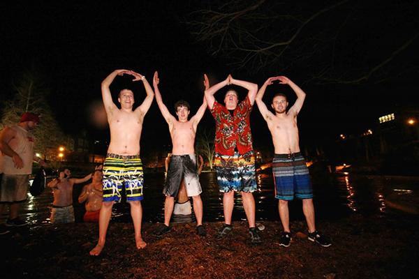 OSU students form O-H-I-O at Mirror Lake during the Mirror Lake Jump in 2014. Credit: Lantern File Photo 