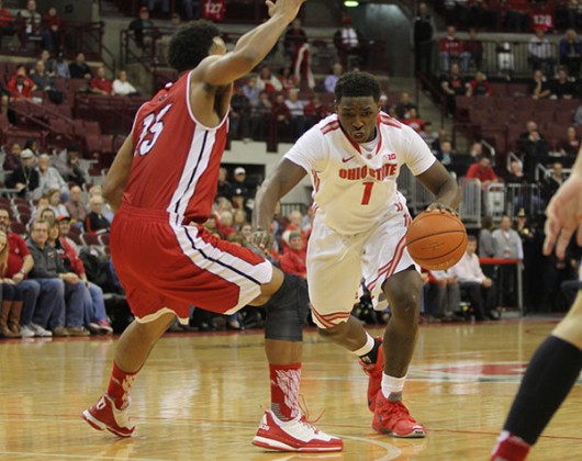 OSU sophomore forward Jae’Sean Tate (1) dribbles the ball during a game against Northern Illinois on Dec. 16 at the Schottenstein Center. Credit: Samantha Hollingshead | Photo Editor