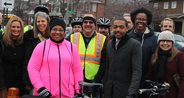 Supporters from the city of Columbus and Yay Bikes! attended the opening of the city's first protected bike lane on Summit Avenue on Thursday. Credit: Megan Neary / For the Lantern