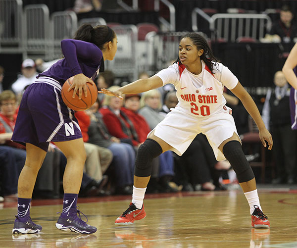 OSU sophomore guard Asia Doss (20) defends during a game against Northwestern on Jan. 28 at the Schottenstein Center. Credit: Samantha Hollingshead | Photo Editor 
