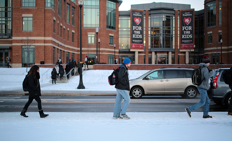 Students brave the cold and snow while walking to class on Jan 12. Credit: Muyao Shen | Asst. Photo Editor