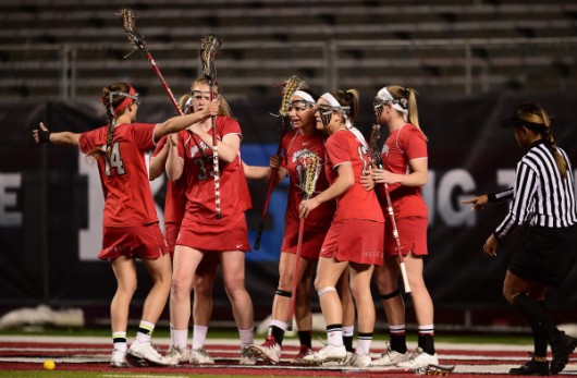 OSU women's lacrosse members celebrate a win over Maryland on May 1. Credit: Courtesy of Ben Soloman 