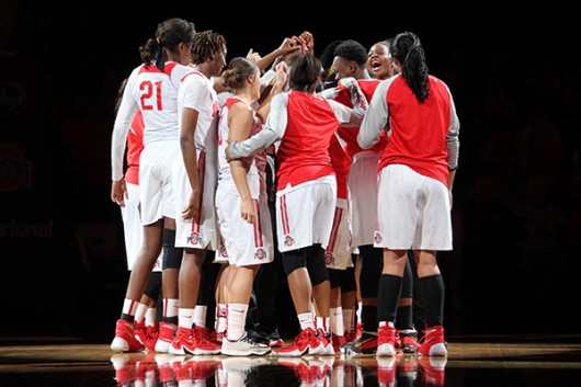 OSU women's basketball players huddle before a game against Rutgers on Jan. 10 at the Schottenstein Center. Credit: Lantern File Photo