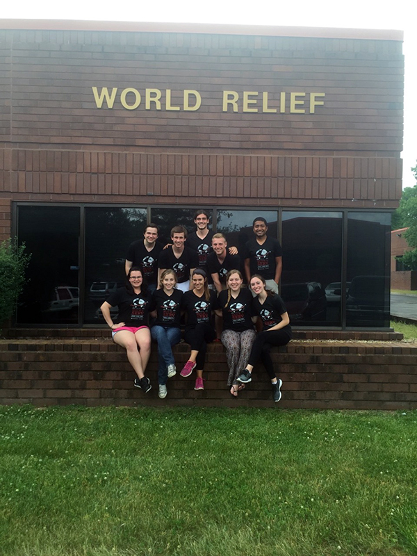 Members from the student organization Students for Refugees pose in front of the World Relief building, who they partner with to provide tutoring services to local refugees. Courtesy of Chelsea Bray
