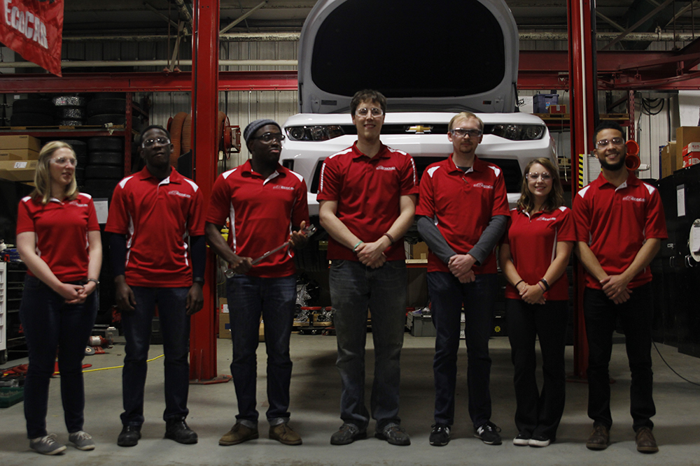 The EcoCAR team stands in front of a modified 2016 Chevrolet Camaro. Credit: Jim Xu / For The Lantern