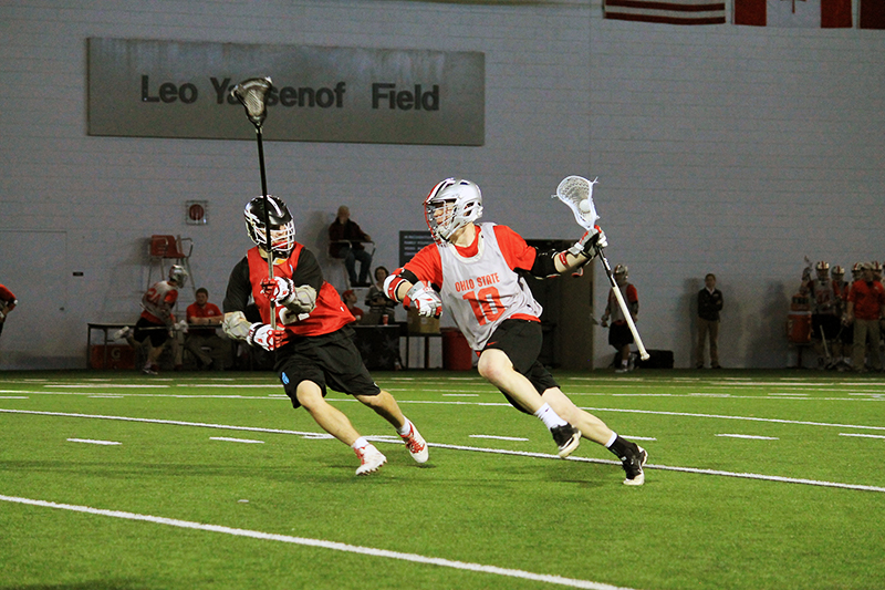 OSU junior midfielder John Kelly (10) during a scrimmage against The Hill Academy on Jan. 30. Credit: Kylie Bryant | | For The Lantern