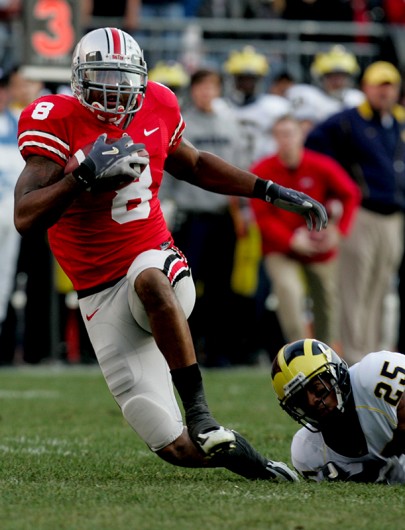 Former OSU wide receiver Roy Hall (8) runs with the ball during a game against Michigan on Nov. 18, 2006. Credit: Courtesy of TNS