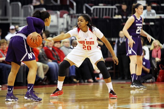 OSU then-sophomore guard Asia Doss (20) defends during a game against Northwestern on Jan. 28 at the Schottenstein Center. Credit: Lantern file photo 