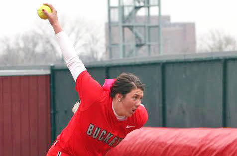 Shelby Hursh (19) winds up a pitch for Sarah Gutknecht (27) of Michigan State during the Ohio State versus Michigan State softball game Saturday March 22, 2014. The Buckeyes beat the Spartans in back-to-back games, scoring 11-7 and 4-3.