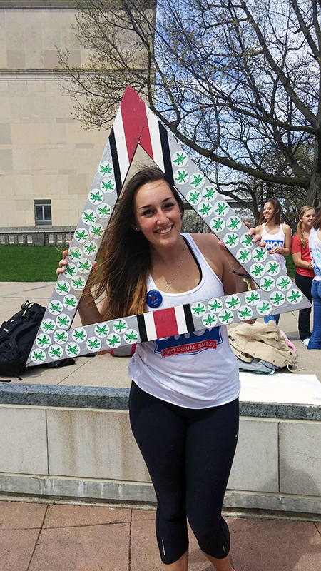 Lauren Wisehart, a second-year in molecular genetics who battled a brain tumor, poses at Tri Delta’s annual DHOP philanthropy event in 2015. Courtesy of Lauren Wisehart.