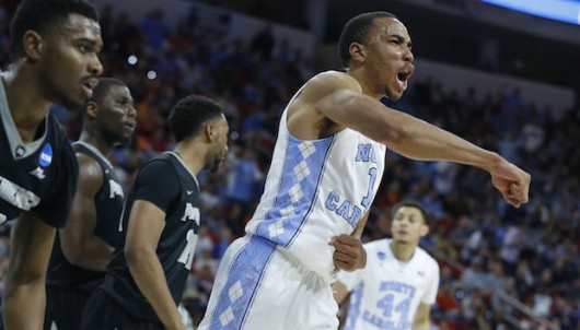 North Carolina's Brice Johnson (11) celebrates after blocking a shot during the second round of the NCAA tournament at PNC Arena in Raleigh, North Carolina, on March 19. Credit: Courtesy of TNS