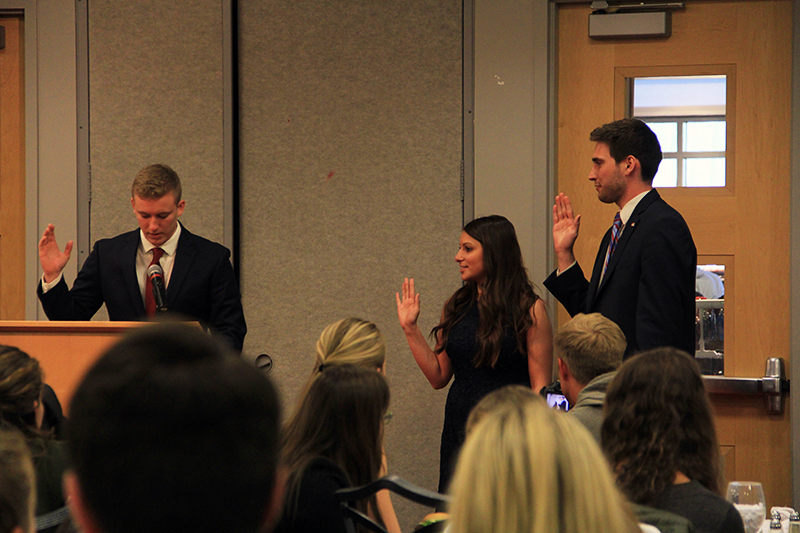 Student Government Vice President Danielle Di Scala (center) and President Gerard Basalla (right) swear in during the 2016 USG Inauguration on April 5 at the Ohio Union. Credit: Samantha Hollingshead | Photo Editor 