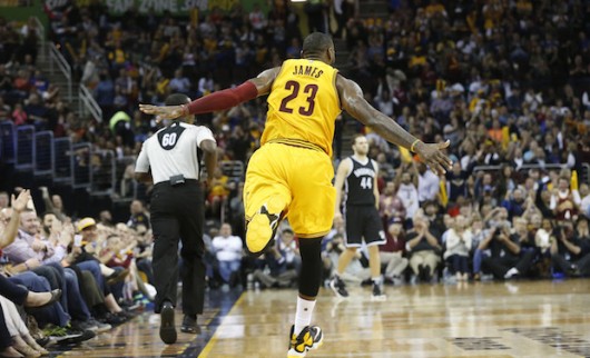 LeBron James of the Cleveland Cavaliers runs down the court after dunking against the Brooklyn Nets during a game at Quicken Loans Arena in Cleveland on March 31. Credit: Courtesy of TNS