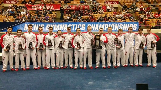 The OSU men's gymnastics team poses for a photo after the NCAA championships on April 16 at St. John Arena. Credit: Luke Swartz | Lantern reporter