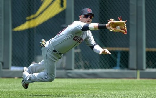 Nick Swisher makes a diving catch against the Kansas City Royals on July 27, 2014. He then played for the Cleveland Indians. Courtesy: TNS