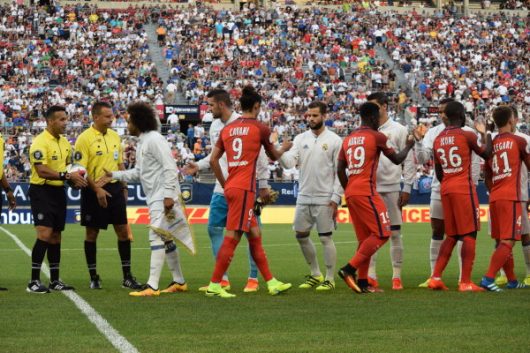 PSG and Real Madrid meet at center pitch before the International Champions Cup friendly at Ohio Stadium on July 27, 2016. Credit: OSU Athletics