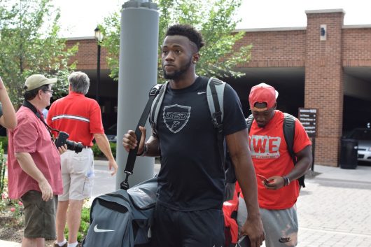Torrance Gibson checking into the team hotel before 2016 fall camp. Credit: Sheridan Hendrix | Lantern Photographer