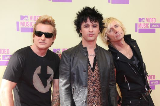 (L-R) Musicians Tre Cool, Billie Joe Armstrong and Mike Dirnt of Green Day arrive at the 2012 'MTV Video Music Awards' in Los Angeles in 2012. Credit: Courtesy of TNS