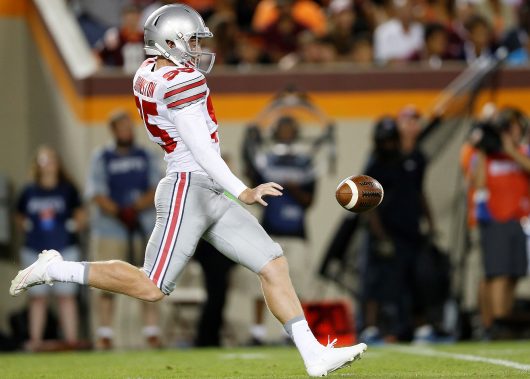 OSU then junior punter Cam Johnston punts the ball during a game against Virginia Tech on Sept. 7, 2015. Credit: Courtesy of OSU Athletics