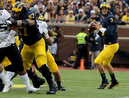 Michigan junior quarterback Wilton Speight (3) looks downfield for an open receiver during first-half action against Central Florida at Michigan Stadium in Ann Arbor, Mich., on Saturday, Sept. 10. Courtesy of TNS