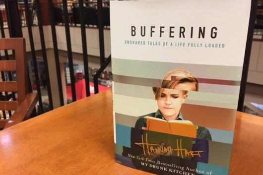 "Buffering: Unshared Tales of a Life Fully Loaded" is written by YouTuber Hannah Hart, who will be doing a book signing on Oct. 22 at the Univesity Bookstore. Credit: Elizabeth Tzagournis