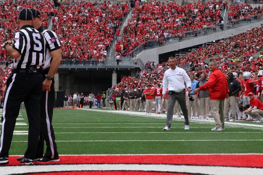 OSU coach Urban Meyer yells towards the referees after a penalty on the Buckeyes during the first half of the game against Rutgers on Oct. 1. The Buckeyes won 58-0. Credit: Alexa Mavrogianis | Photo Editor 