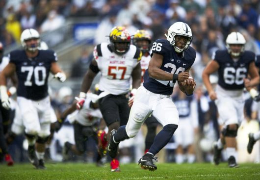 Penn State sophomore running back Saquon Barkley (26) runs toward the end zone against Maryland on Oct. 8. Credit: Courtesy of TNS