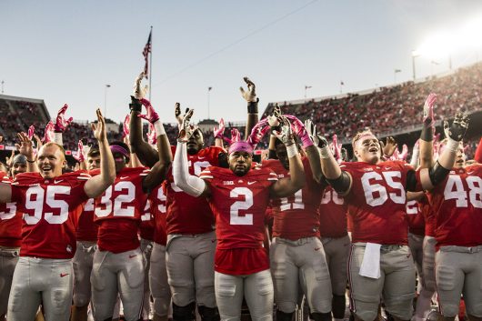 Members of the Ohio State football team celebrate their 38-17 victory over Indiana on Oct. 8 by singing 'Carmen Ohio.' Credit: Alexa Mavrogianis | Photo Editor