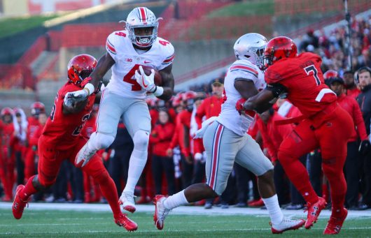 OSU junior H-back Curtis Samuel breaks away from a tackle during the Buckeyes' game against Maryland on Nov. 12. Credit: Alexa Mavrogianis | Photo Editor