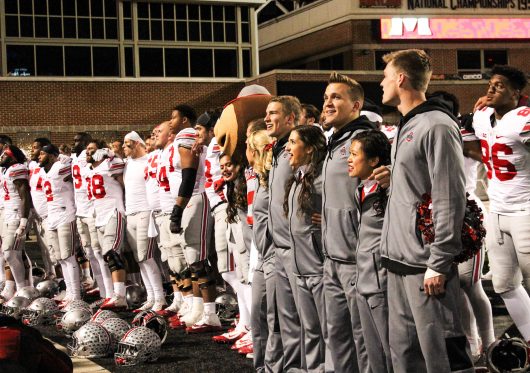 The OSU football team and cheerleaders sing "Carmen" following the Buckeyes 62-3 win over Maryland on Nov. 12. Credit: Alexa Mavrogianis | Photo Editor