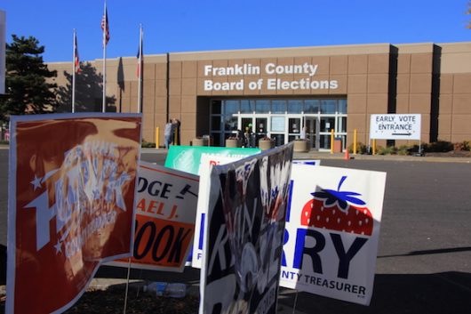 Political signs line the parking lot of the Franklin County Board of Elections on Nov. 7. Credit: Nick Roll | Campus Editor
