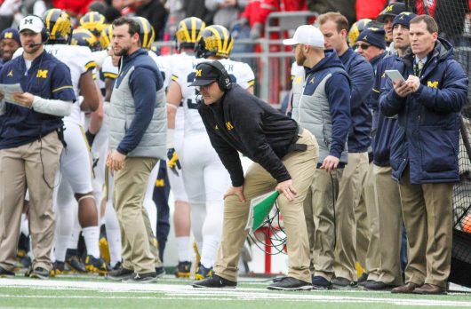 Michigan football coach Jim Harbaugh looks on after the last touchdown during the game on Nov. 26 at Ohio Stadium. The Buckeyes won 30-27. Credit: Mason Swires | Assistant Photo Editor