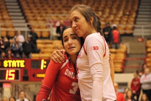 Sophomore setter Taylor Hughes hugs senior libero Valeria Leon during the Ohio State women's volleyball Senior Night recognition after a victory over Indiana on Nov. 26 at St. John Arena. Credit: Jenna Leinasars | Assistant News Director