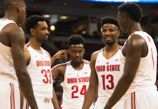 The Ohio State men's basketball team gathers together after a foul during its exhibition match-up against Walsh on Nov. 6. The Buckeyes won 85-67. Credit: Alexa Mavrogianis | Photo Editor