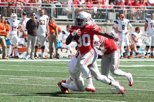 OSU freshman running back Demario McCall breaks into the open field in the fourth quarter against the Bowling Green Falcons on Sept 3, 2016. OSU won 77-10. Credit: Mason Swires | Assistant Photo Editor 