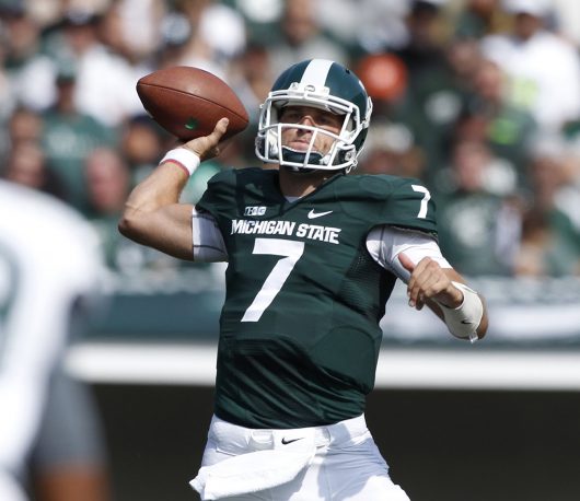 Michigan State quarterback Tyler O'Connor passes the ball during the Spartans game against Eastern Michigan on Sept. 20, 2014. The Spartans beat the Eagles 73-14. Credit: Courtesy of TNS