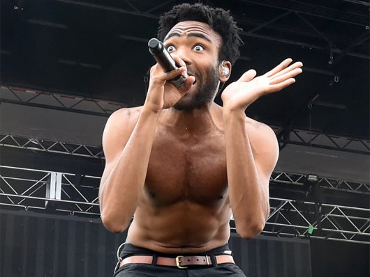 Donald Glover, also known as, Childish Gambino performs on the main stage on the infield before the 140th running of the Preakness Stakes on Saturday, May 16, 2015, at Pimiico Race Course in Baltimore. Credit: Courtesy of TNS