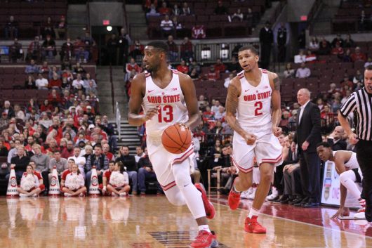 OSU sophomore guard JaQuan Lyle and senior forward Marc Loving bring the ball up the court against Fairleigh Dickinson on Dec. 3 at the Schottenstein Center. Credit: Mason Swires | Assistant Photo Editor 